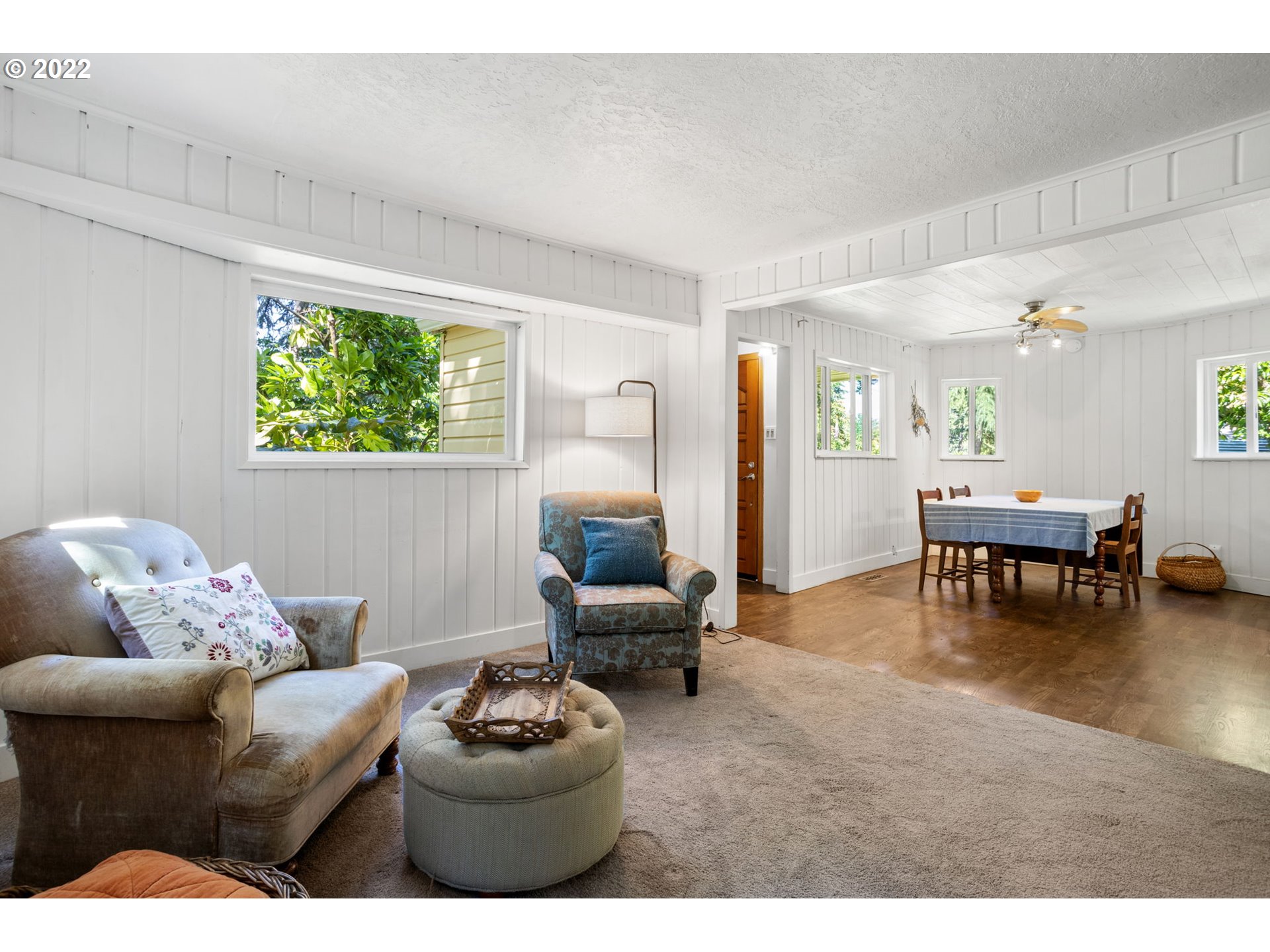 2020 Southeast Waldron Road Milwaukie, OR 97222 - Photo 10 of 32 a living room with furniture and a large window