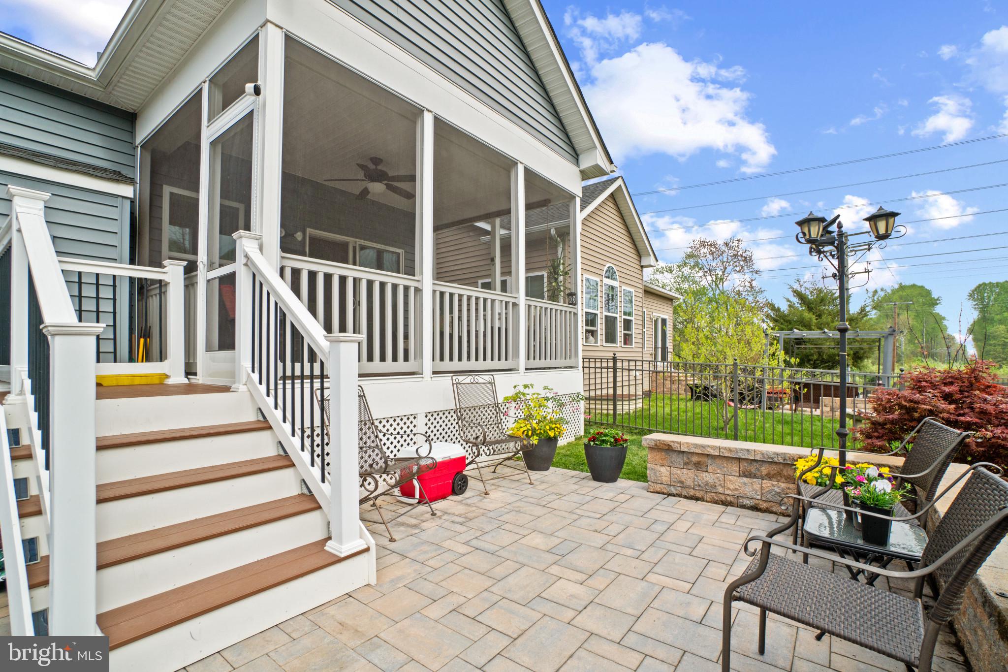 1373 Patuxent Ridge Road Odenton, MD 21113 - Photo 38 of 74 Screened-In Porch leads to the Paved Patio!