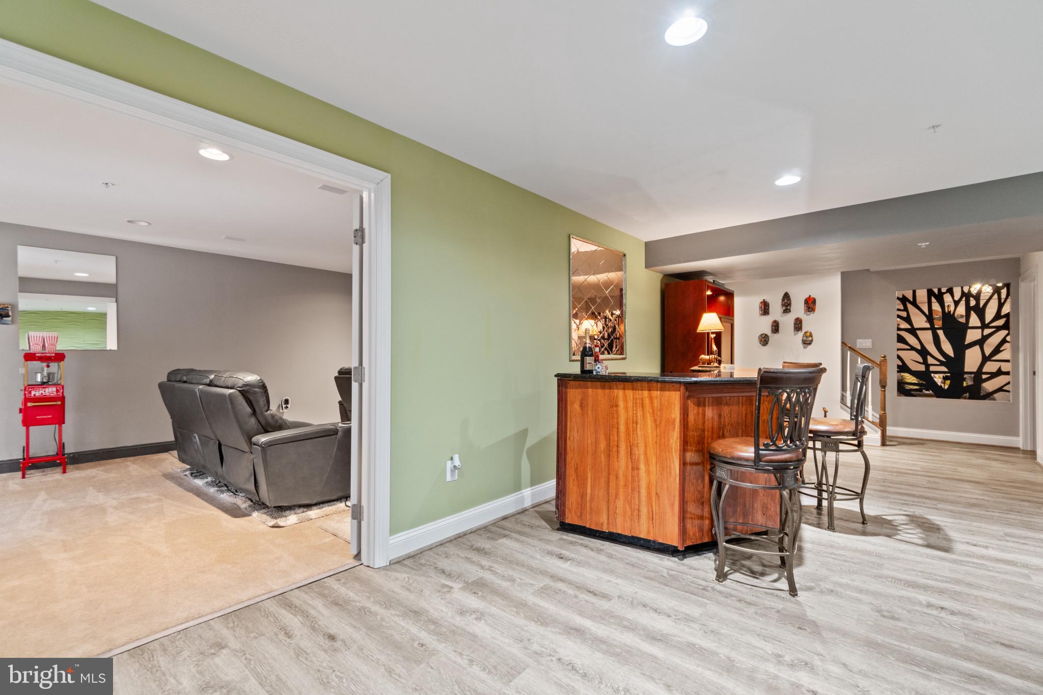 1373 Patuxent Ridge Road Odenton, MD 21113 - Photo 60 of 74 Family Room - View of Bar Area & Theatre Room