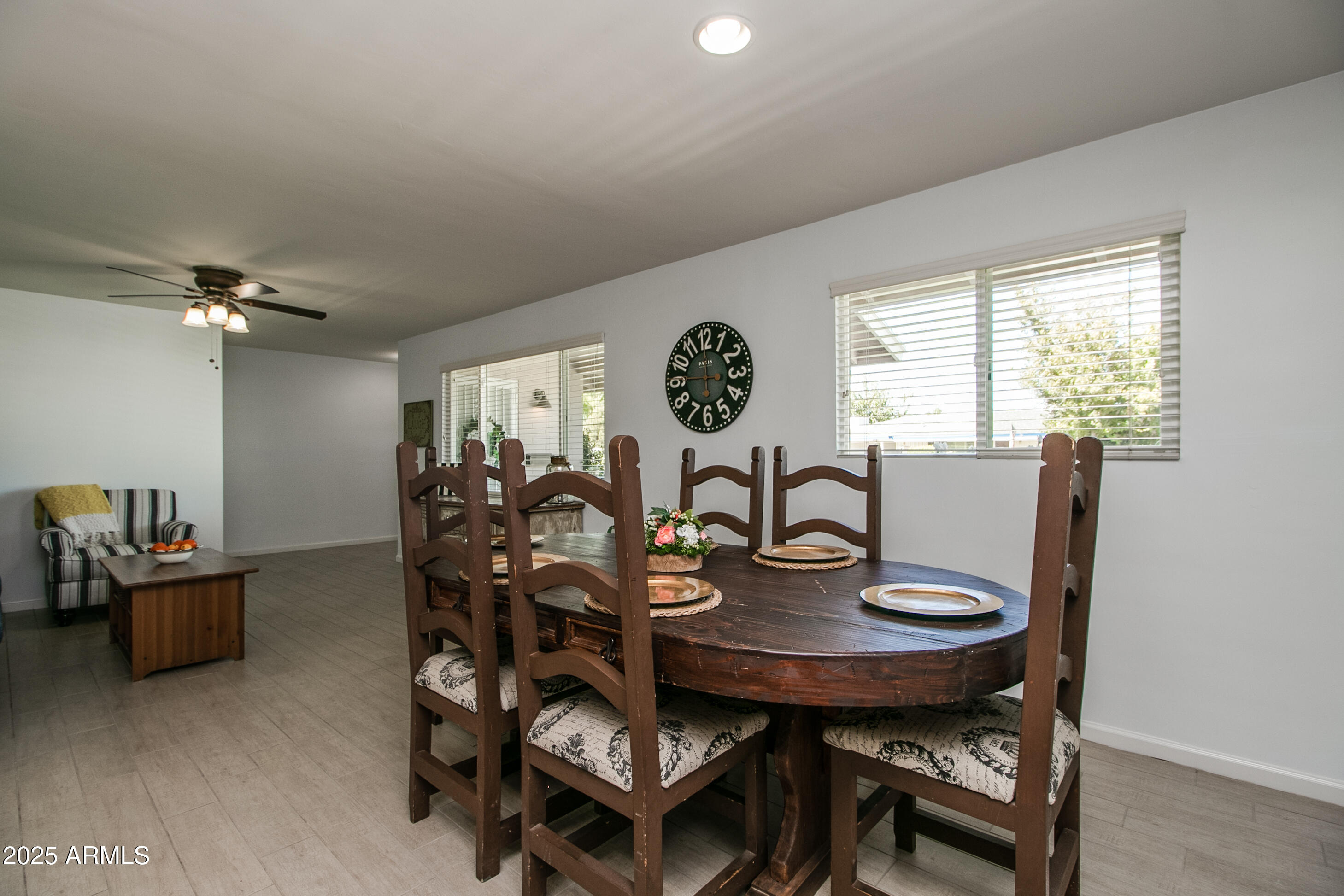 2017 West Edgemont Avenue Phoenix, AZ 85009 - Photo 12 of 53 a view of a dining room with furniture and chandelier