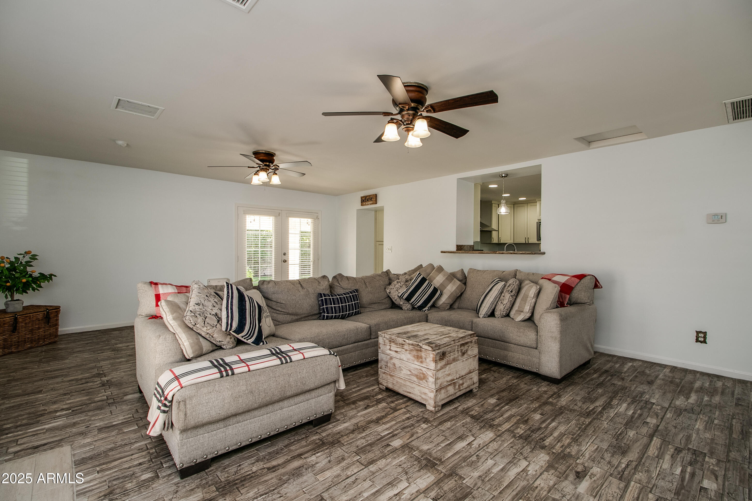 2017 West Edgemont Avenue Phoenix, AZ 85009 - Photo 20 of 53 a living room with furniture and a ceiling fan