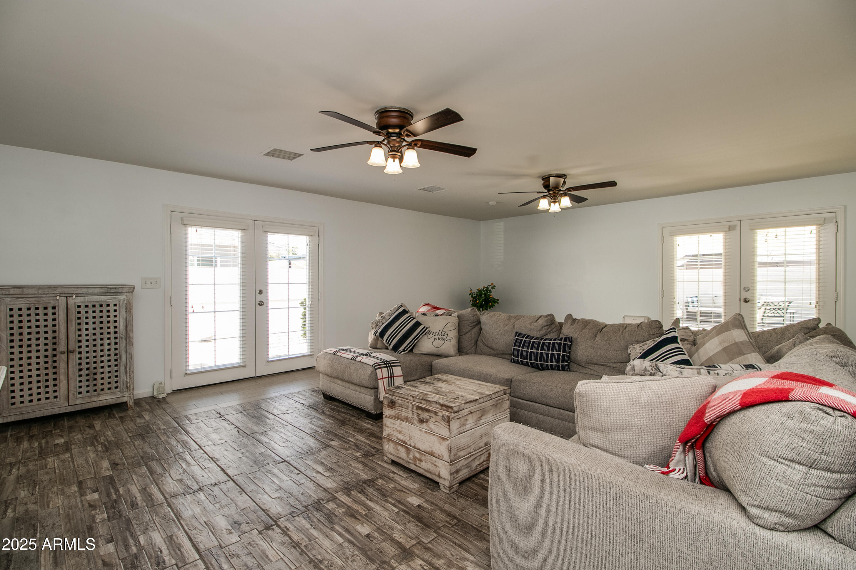 2017 West Edgemont Avenue Phoenix, AZ 85009 - Photo 21 of 53 a living room with furniture ceiling fan and a window
