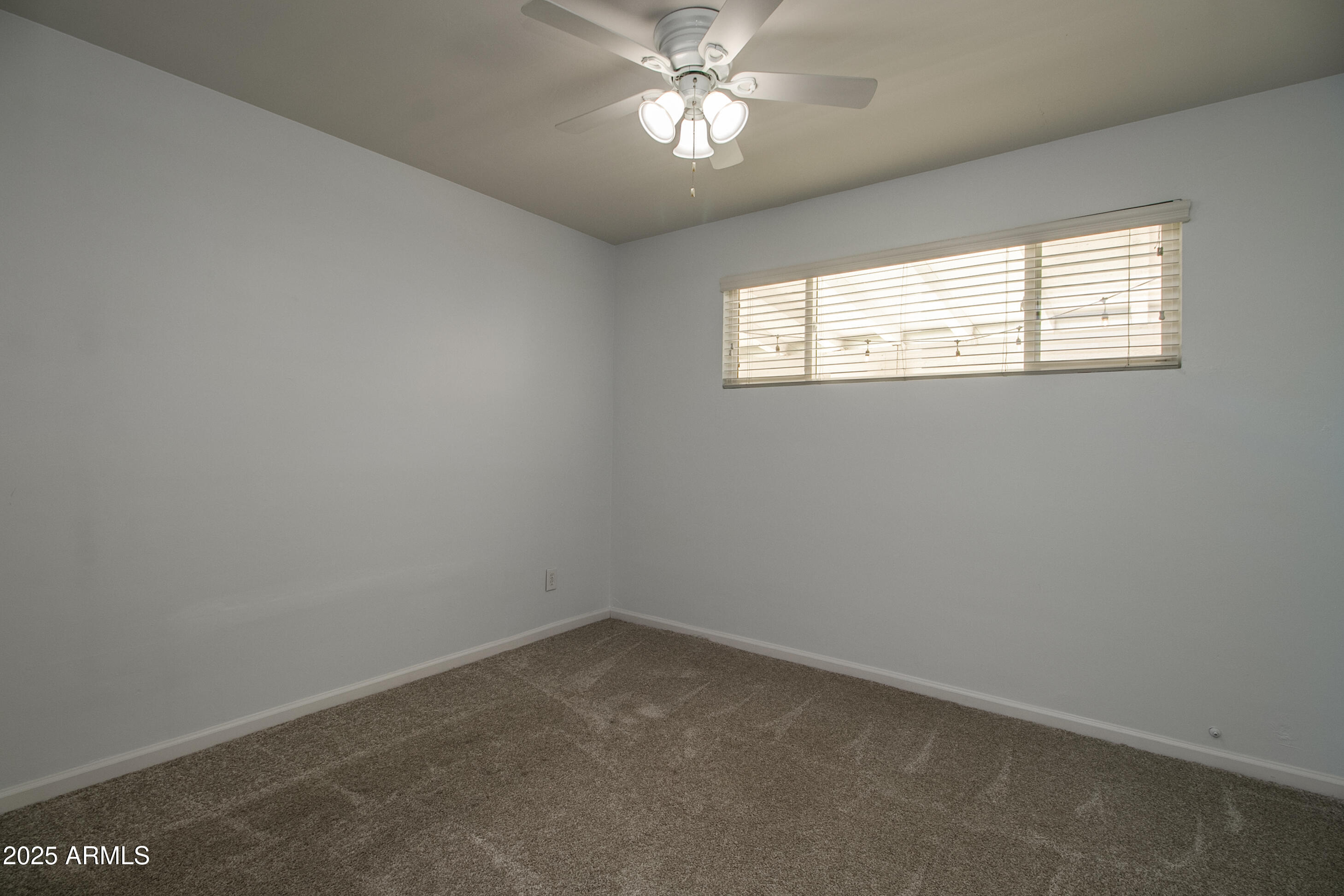 2017 West Edgemont Avenue Phoenix, AZ 85009 - Photo 30 of 53 an empty room with a window