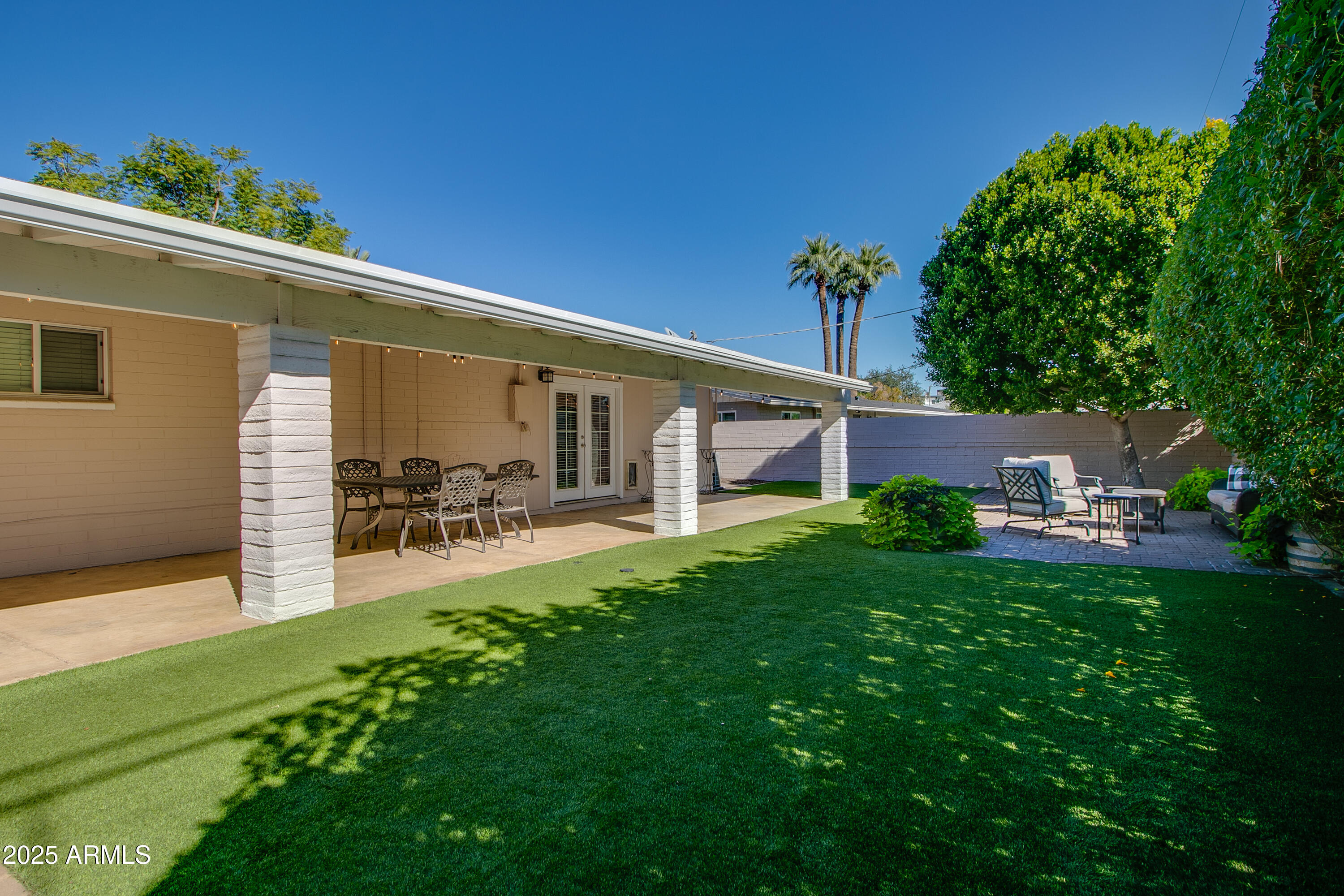 2017 West Edgemont Avenue Phoenix, AZ 85009 - Photo 42 of 53 a view of a house with backyard porch and sitting area
