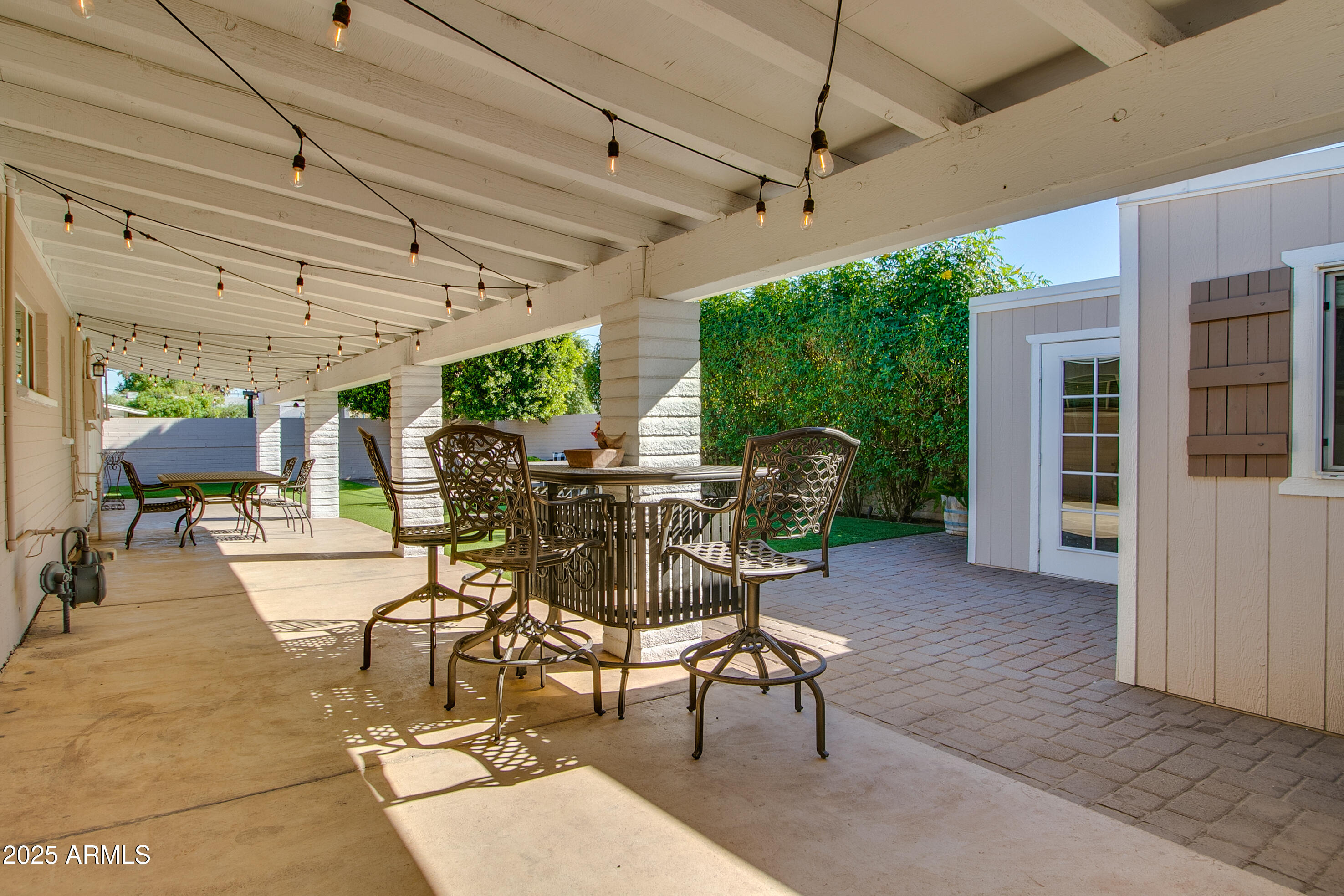 2017 West Edgemont Avenue Phoenix, AZ 85009 - Photo 44 of 53 a view of a patio with table and chairs potted plants with wooden floor