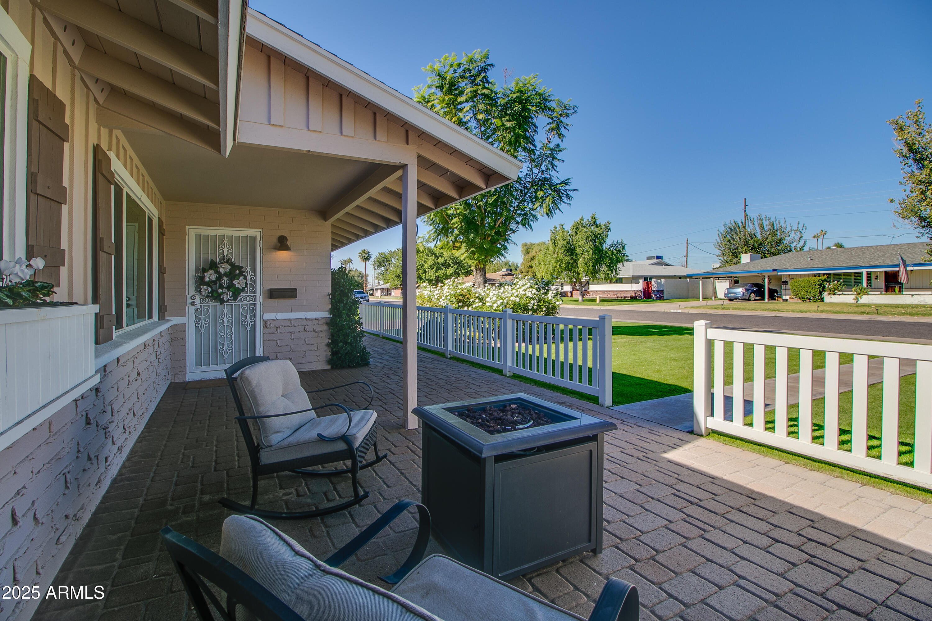 2017 West Edgemont Avenue Phoenix, AZ 85009 - Photo 3 of 53 a view of a patio with a table and chairs