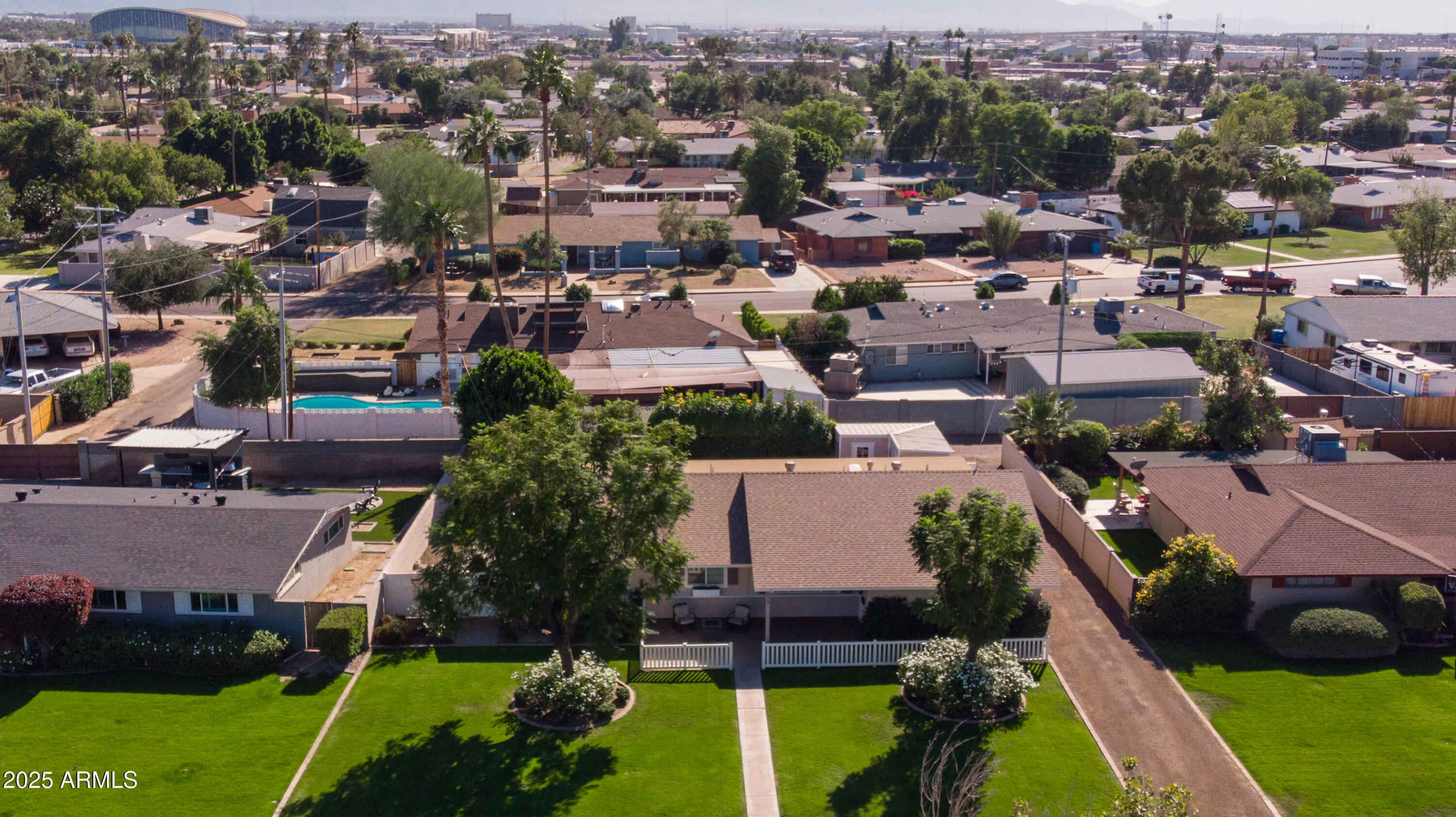 2017 West Edgemont Avenue Phoenix, AZ 85009 - Photo 50 of 53 an aerial view of a houses with a green yard