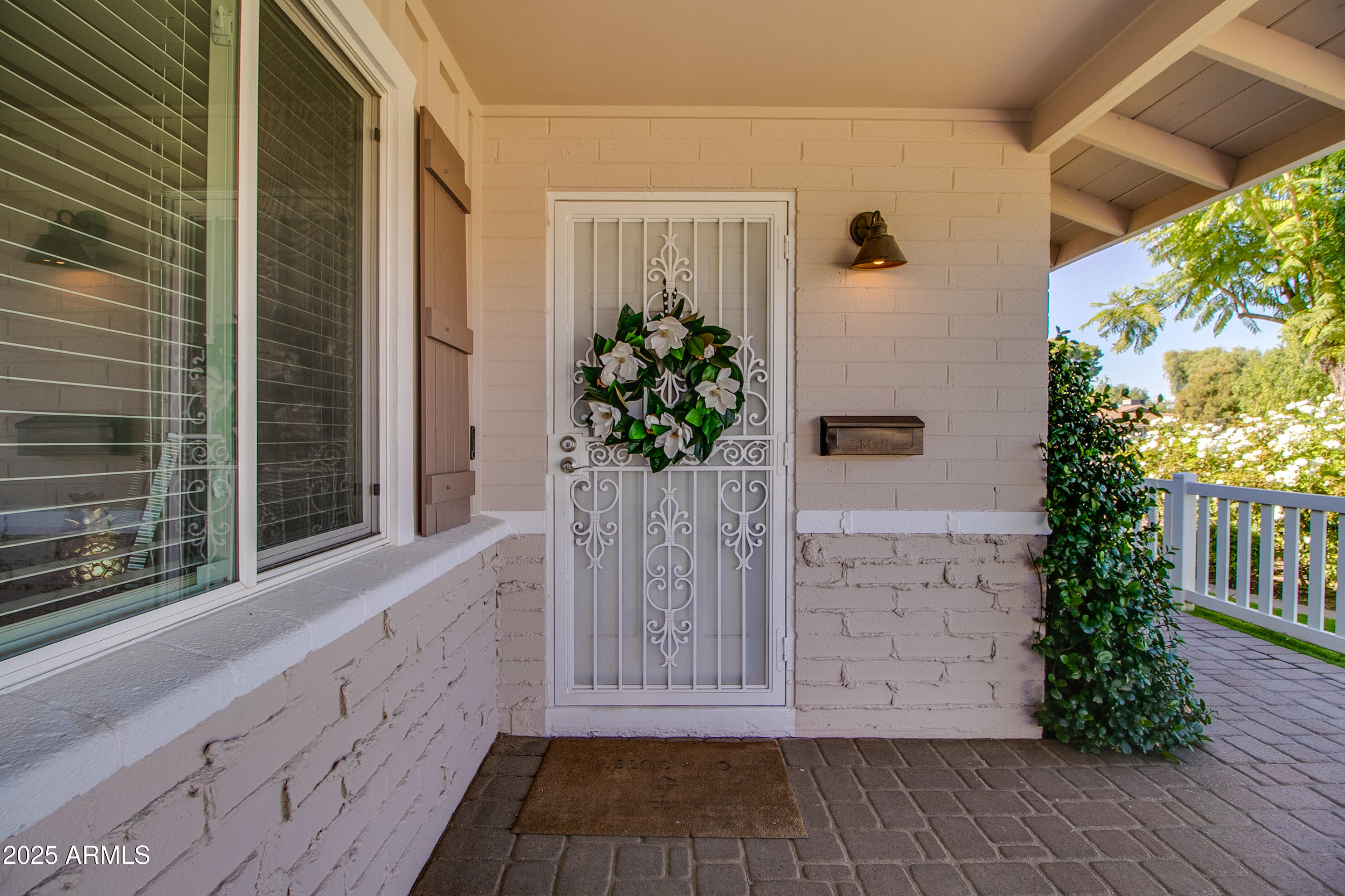 2017 West Edgemont Avenue Phoenix, AZ 85009 - Photo 4 of 53 a view of entryway with flower pots
