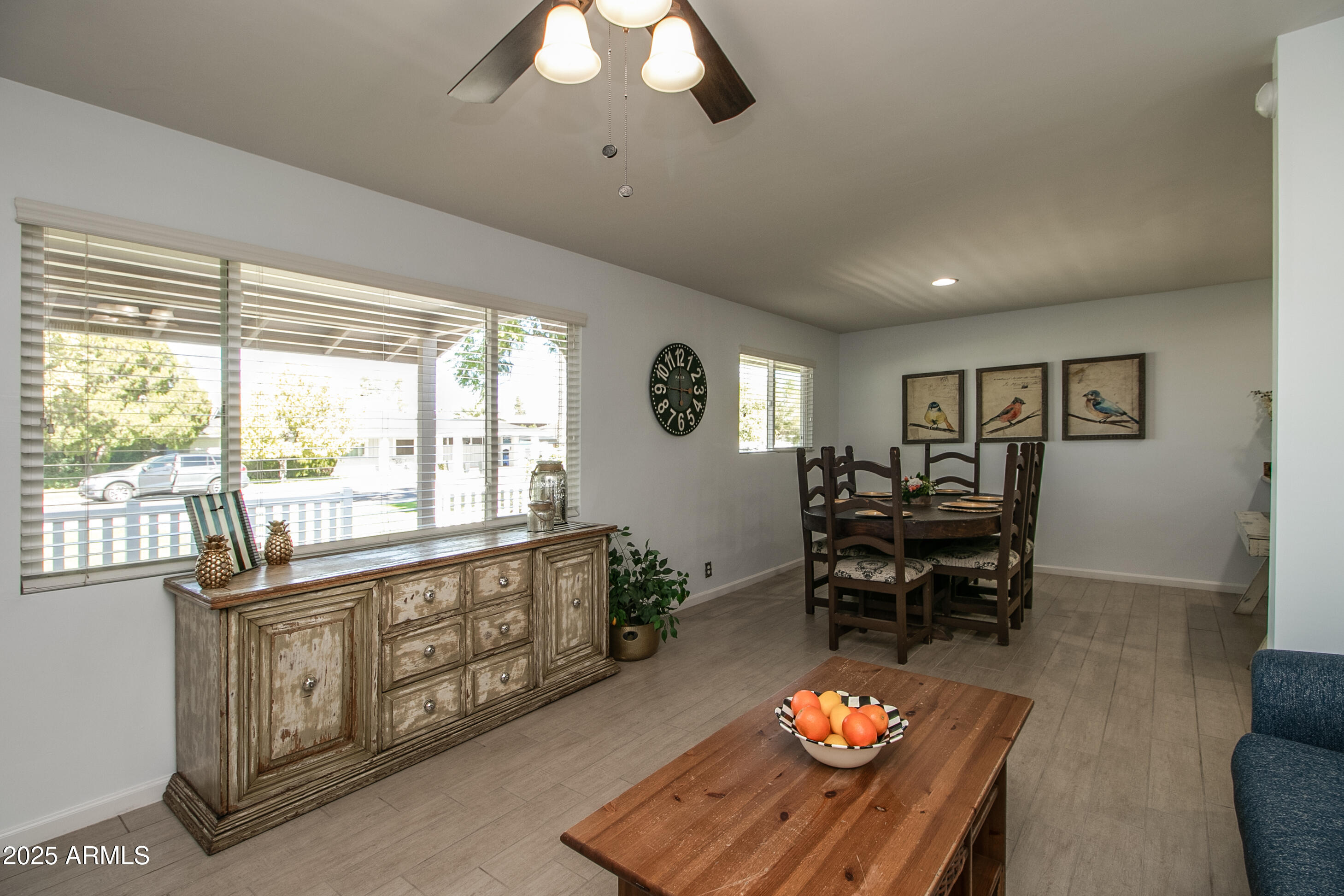 2017 West Edgemont Avenue Phoenix, AZ 85009 - Photo 6 of 53 a living room with furniture a dining table and a piano table