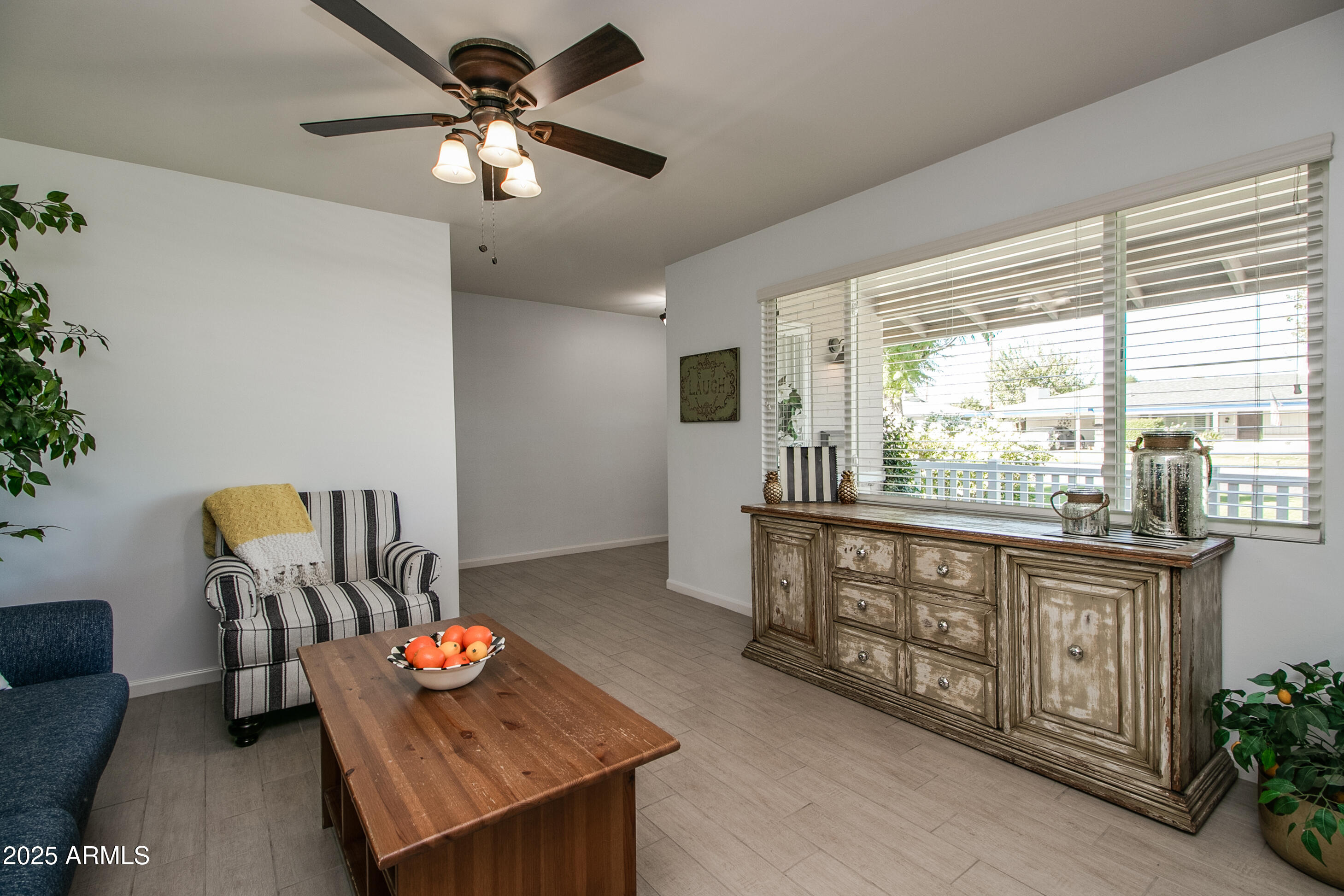2017 West Edgemont Avenue Phoenix, AZ 85009 - Photo 8 of 53 a living room with furniture and a large window