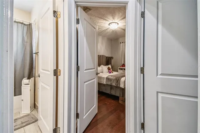 a room with a bed and a chair