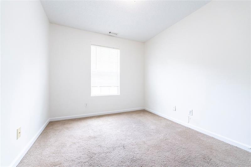 6045 Capitol Knoll Fairburn, GA 30213 - Photo 26 of 37 an empty room with a window