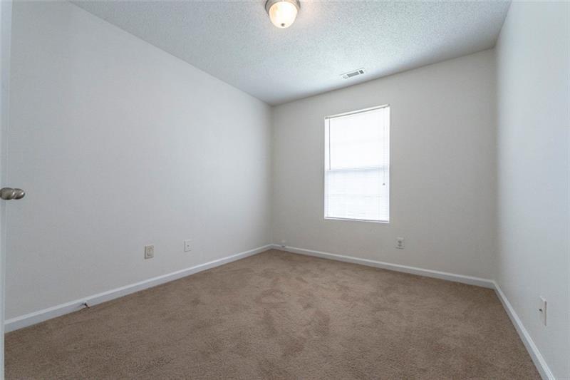 6045 Capitol Knoll Fairburn, GA 30213 - Photo 29 of 37 an empty room with a window