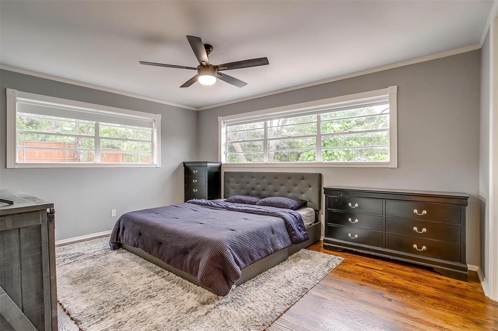 6609 Genoa Road Fort Worth, TX 76116 - Photo 22 of 39 Bedroom with ornamental molding, wood finished floors, and ceiling fan