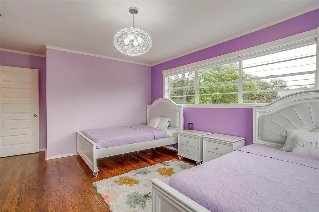 6609 Genoa Road Fort Worth, TX 76116 - Photo 25 of 39 Bedroom featuring a chandelier, crown molding, and wood finished floors
