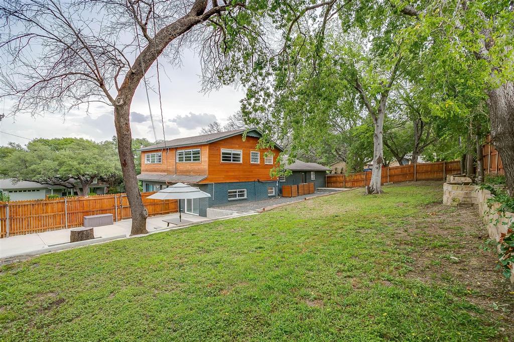 6609 Genoa Road Fort Worth, TX 76116 - Photo 37 of 39 Fenced backyard featuring a patio area