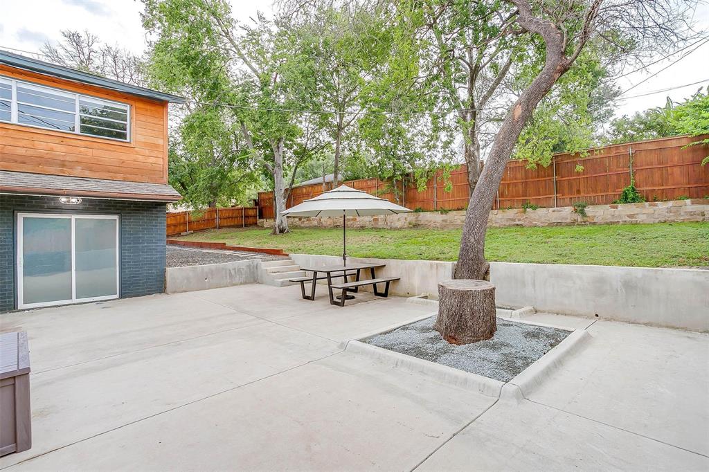 6609 Genoa Road Fort Worth, TX 76116 - Photo 38 of 39 Fenced backyard with a patio