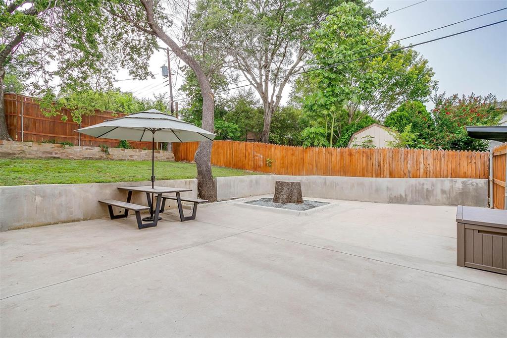 6609 Genoa Road Fort Worth, TX 76116 - Photo 39 of 39 Fenced backyard with a patio