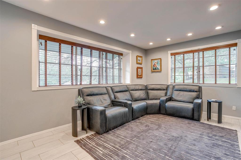 6609 Genoa Road Fort Worth, TX 76116 - Photo 9 of 39 Cinema room with plenty of natural light and recessed lighting