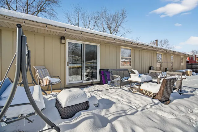 a view of snow on the side of the road