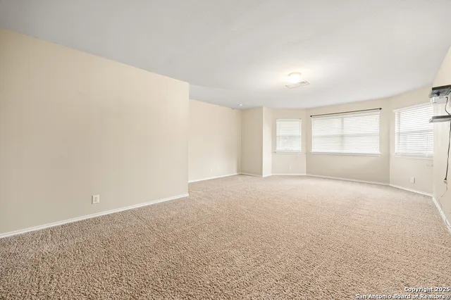 an empty room with window