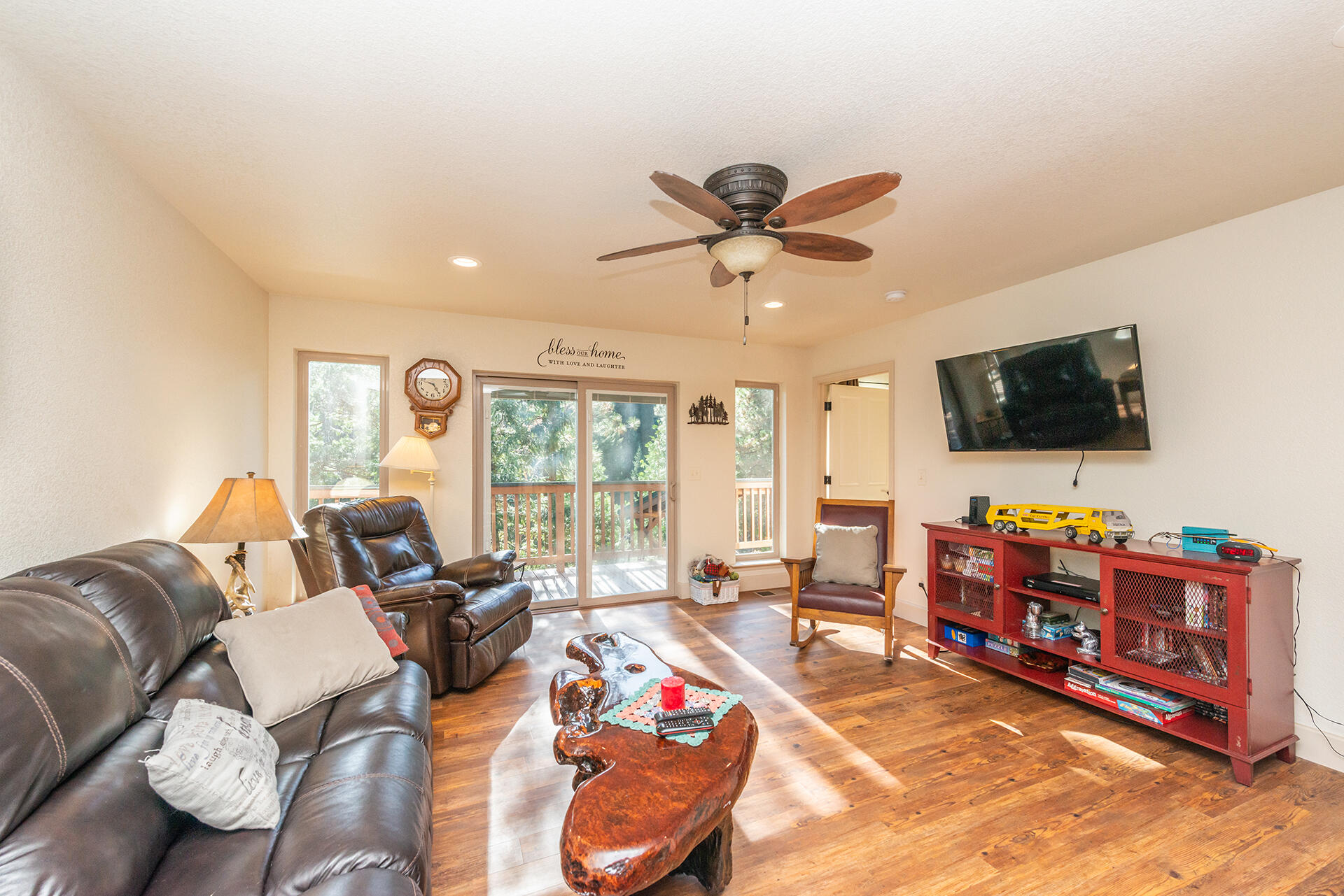851 Mountain Aire Road Trinity Center, CA 96091 - Photo 12 of 54 a living room with furniture and a flat screen tv