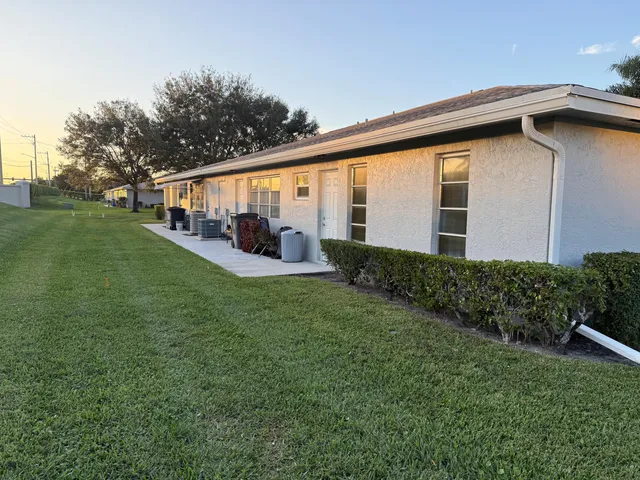 a view of a back yard of the house