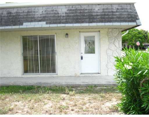 9801 Hidden Lane, Unit 3 Port Richey, FL 34668 - Photo 1 of 1 Exterior Front