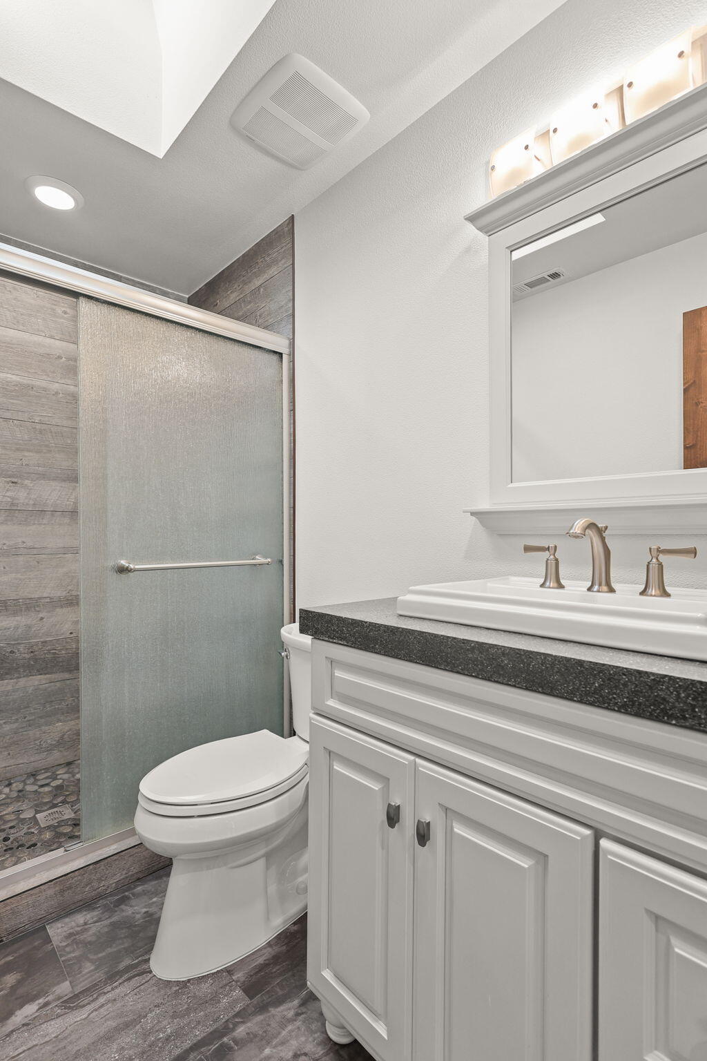 4315 Webb Road Anderson, CA 96007 - Photo 22 of 49 a bathroom with a sink a toilet and shower