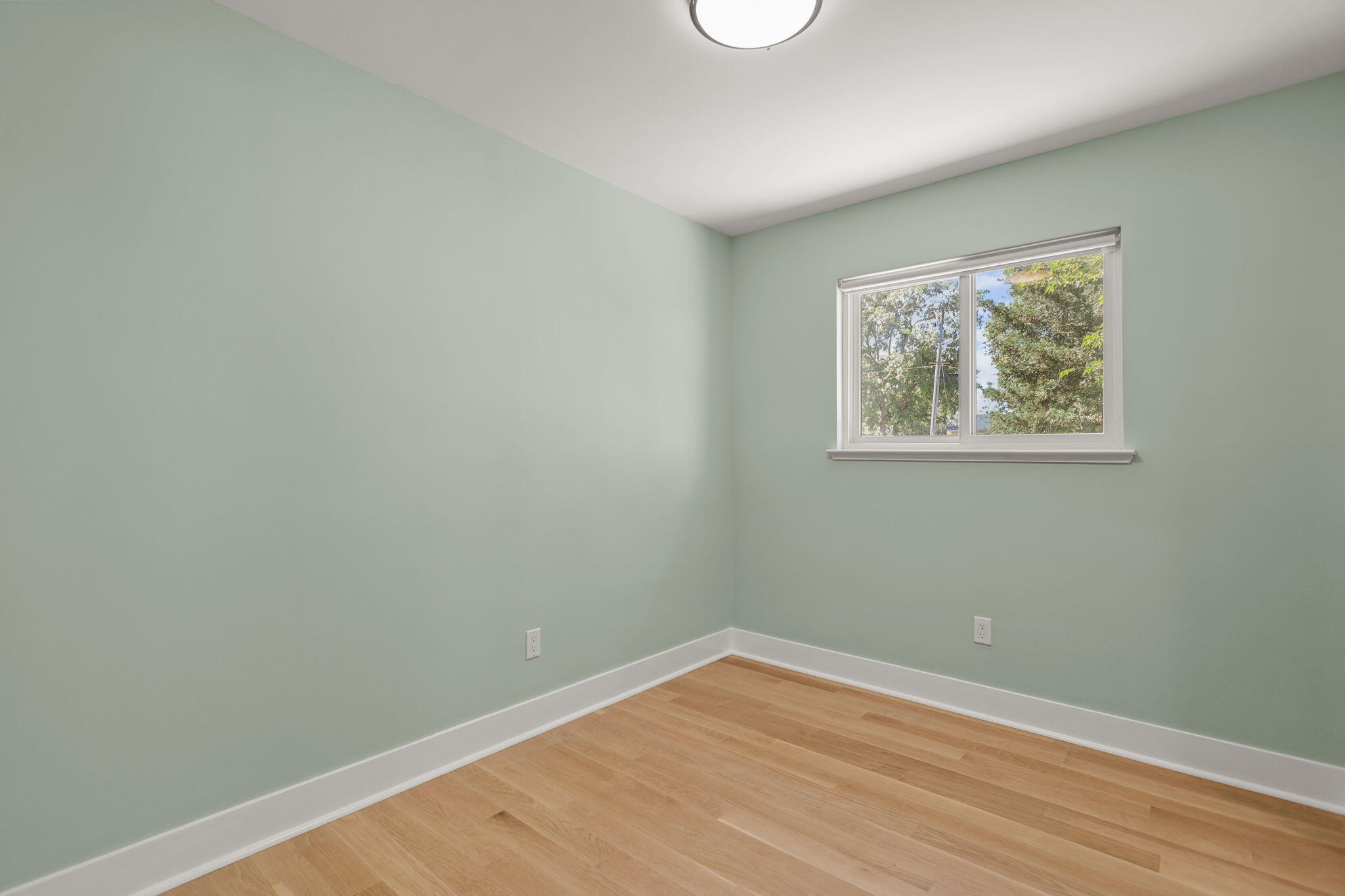 4315 Webb Road Anderson, CA 96007 - Photo 23 of 49 a view of an empty room with wooden floor and a window