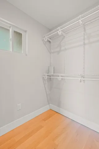 a view of a room with racks on the wall