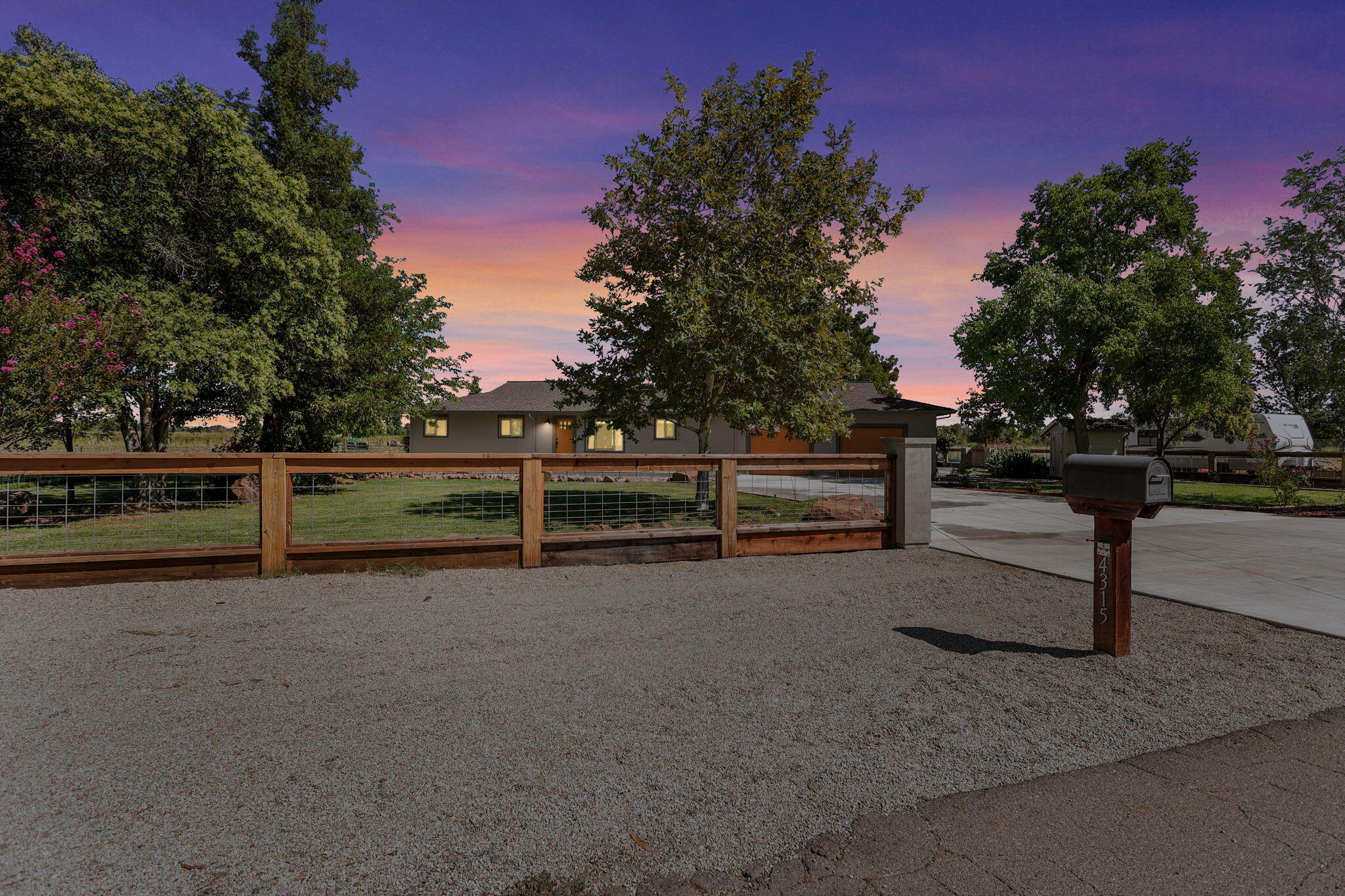 4315 Webb Road Anderson, CA 96007 - Photo 5 of 49 a view of backyard with wooden fence and large trees
