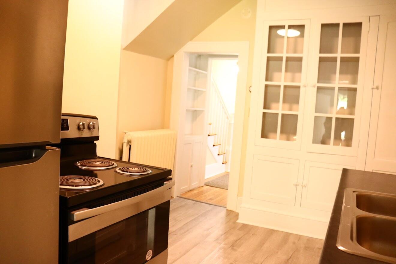 7760 Williamson Road Roanoke, VA 24019 - Photo 14 of 16 a kitchen with stainless steel appliances granite countertop a stove and a refrigerator