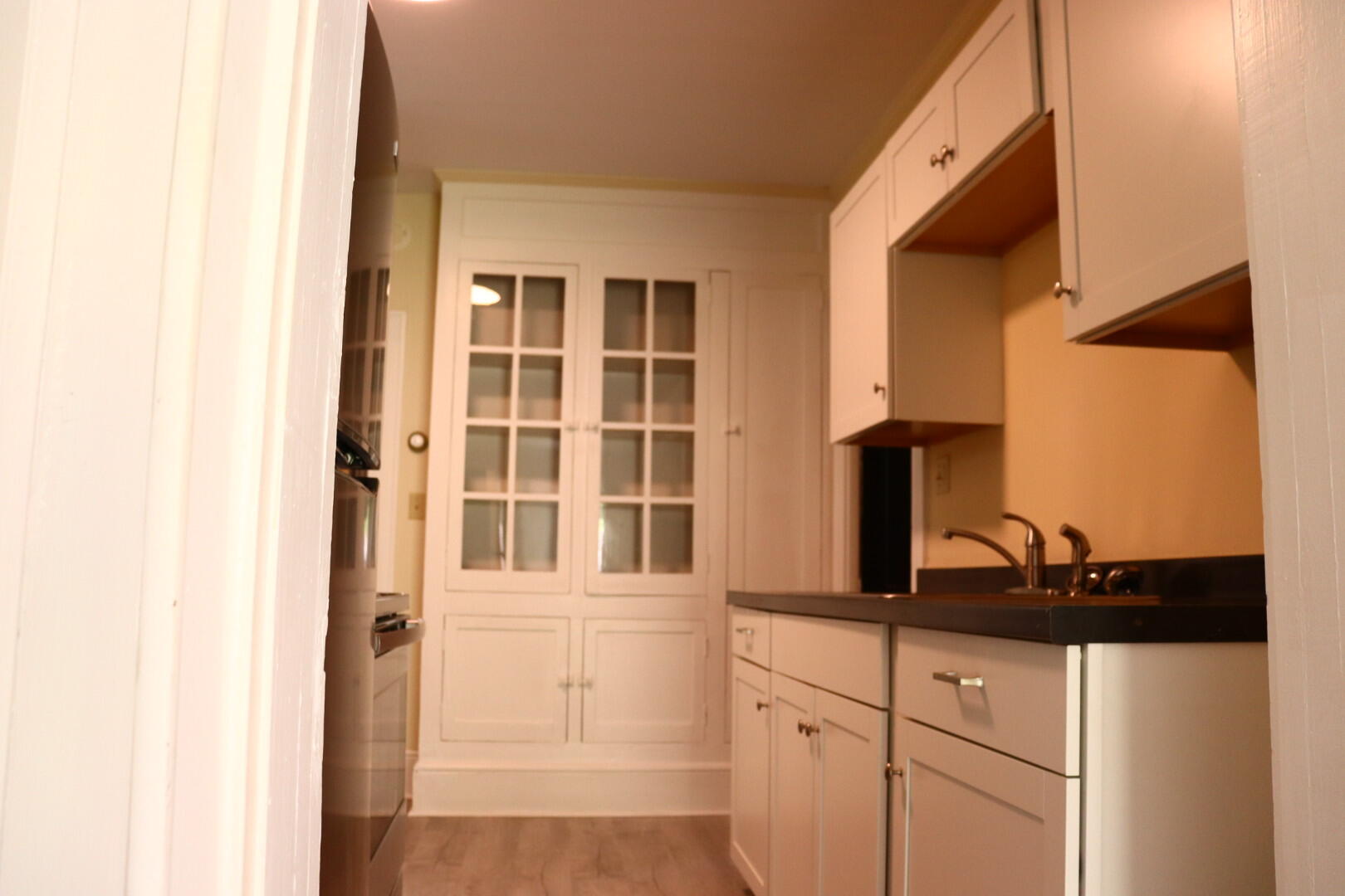 7760 Williamson Road Roanoke, VA 24019 - Photo 15 of 16 a kitchen with a sink and a mirror