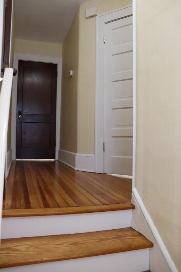 7760 Williamson Road Roanoke, VA 24019 - Photo 8 of 16 a view of walk in closet with wooden floor