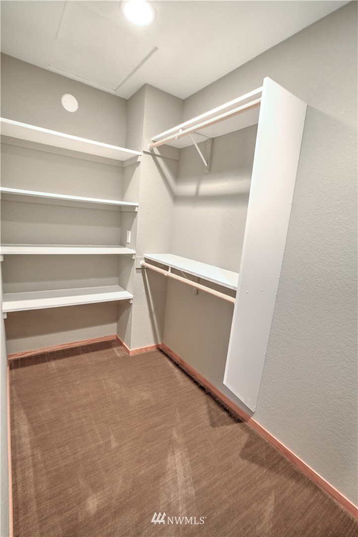 7736 Fairview Road Southwest Tumwater, WA 98512 - Photo 20 of 25 a view of an empty walk in closet