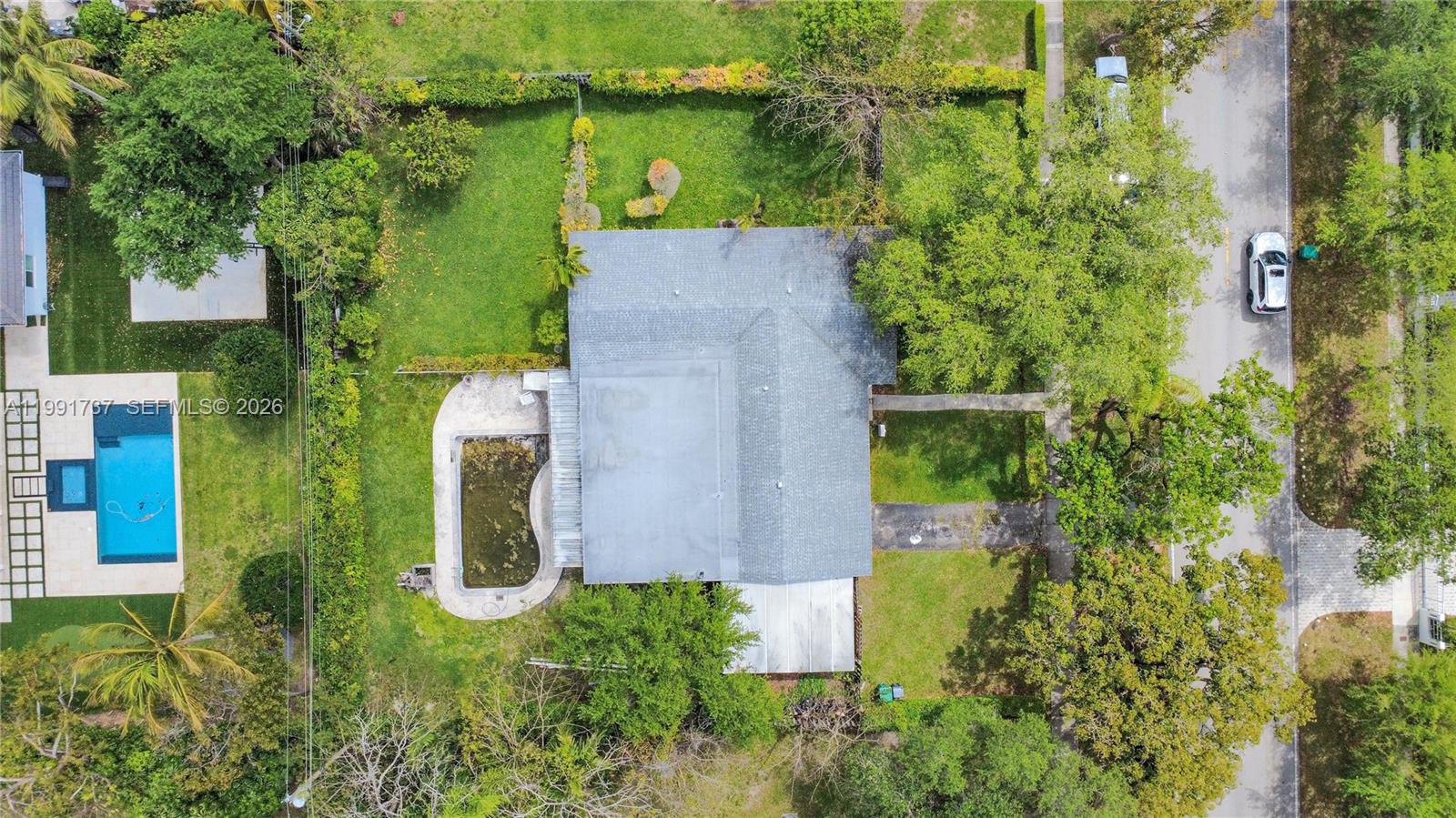 8285 Southwest 104th Street Miami, FL 33156 - Photo 12 of 21 an aerial view of a house with a yard basket ball court and outdoor seating