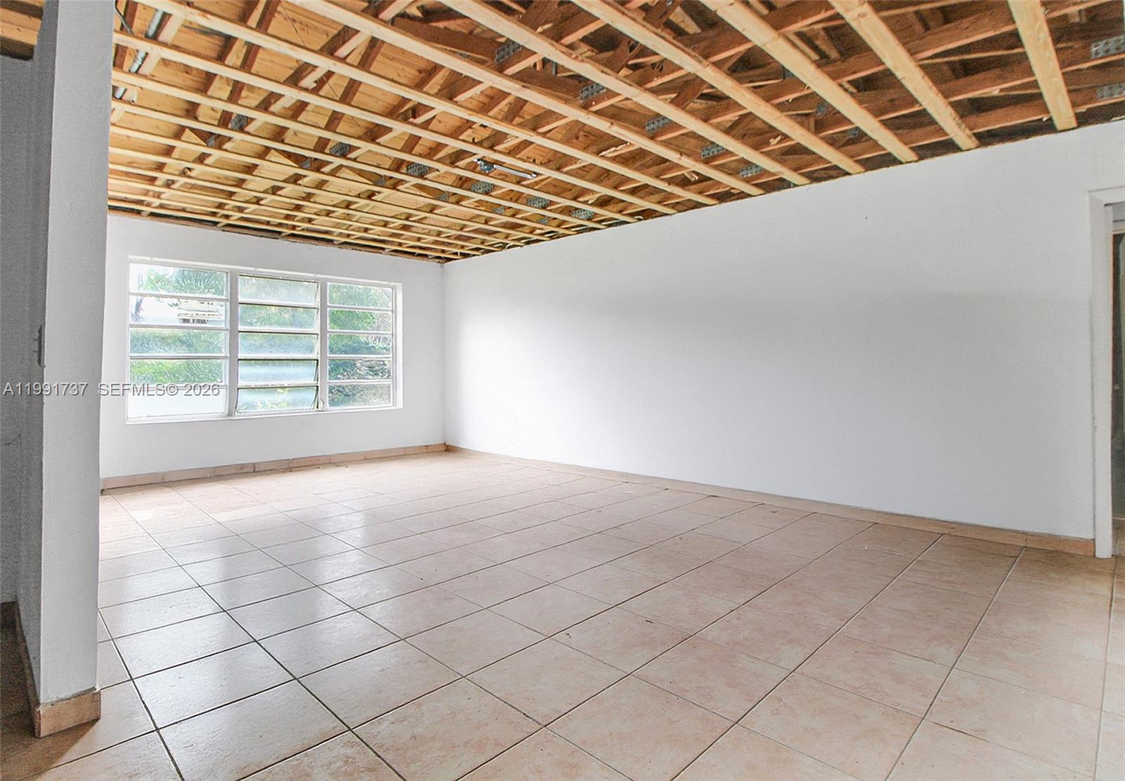 8285 Southwest 104th Street Miami, FL 33156 - Photo 18 of 21 an empty room with windows