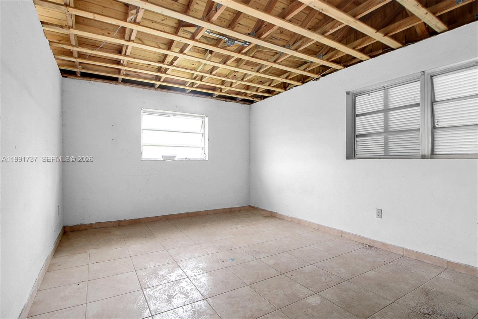 8285 Southwest 104th Street Miami, FL 33156 - Photo 21 of 21 a view of a room with windows