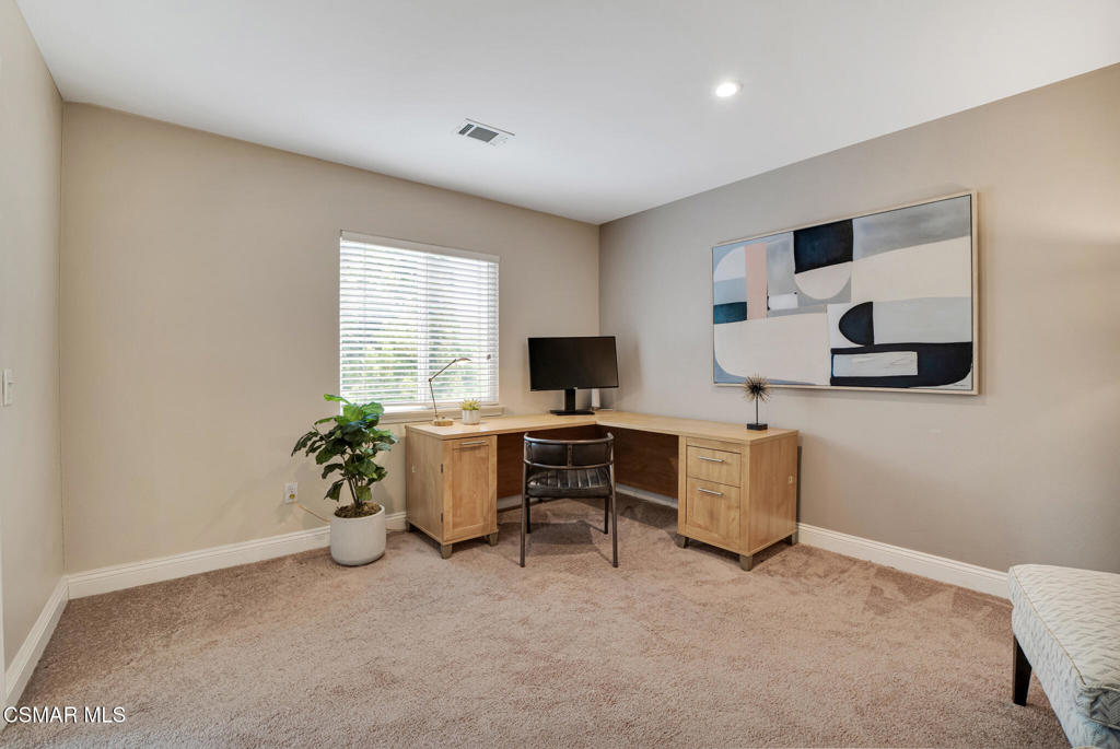 2339 Rudolph Drive Simi Valley, CA 93065 - Photo 23 of 60 a view of a workspace with furniture and a window