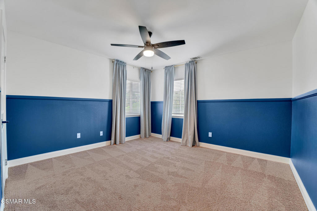 2339 Rudolph Drive Simi Valley, CA 93065 - Photo 34 of 60 a view of an empty room with a ceiling fan