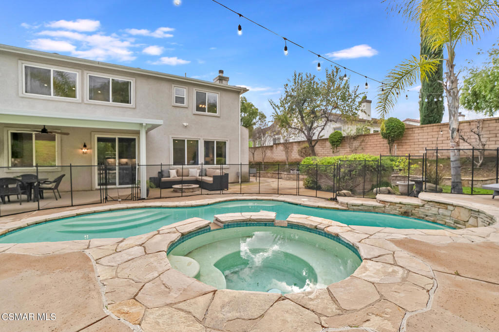 2339 Rudolph Drive Simi Valley, CA 93065 - Photo 43 of 60 a swimming pool with outdoor seating and yard