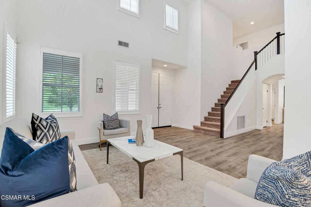2339 Rudolph Drive Simi Valley, CA 93065 - Photo 8 of 60 a living room with furniture and a window
