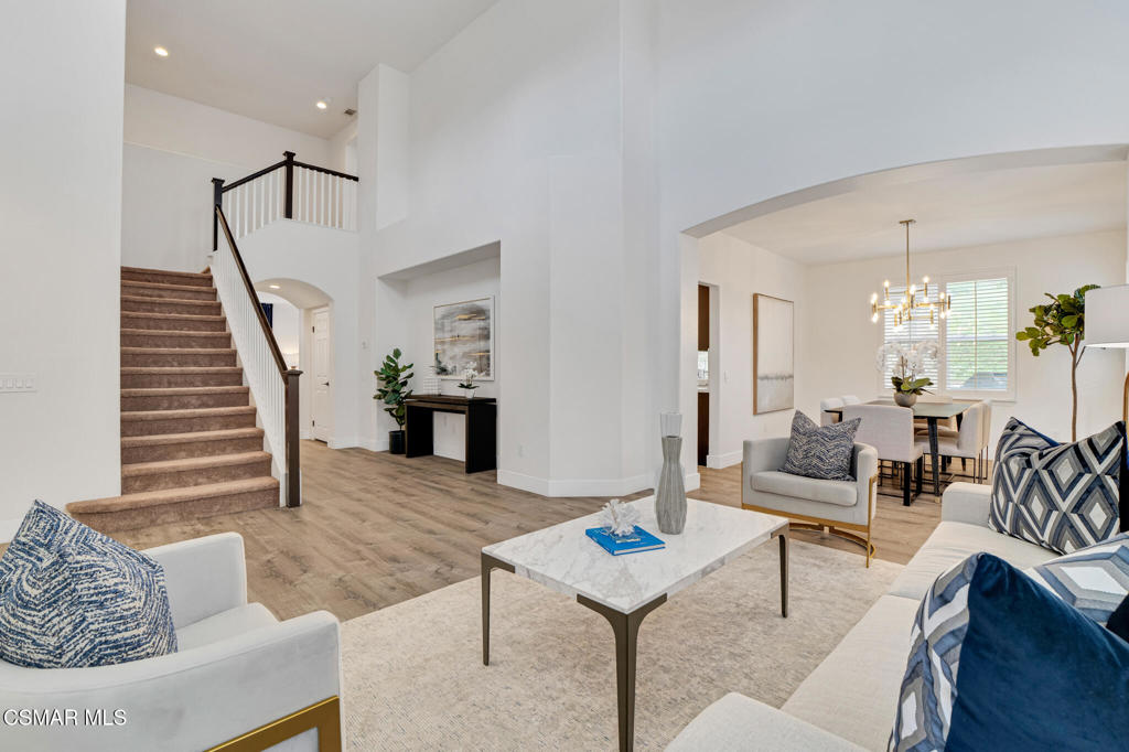 2339 Rudolph Drive Simi Valley, CA 93065 - Photo 9 of 60 a living room with furniture and a wooden floor