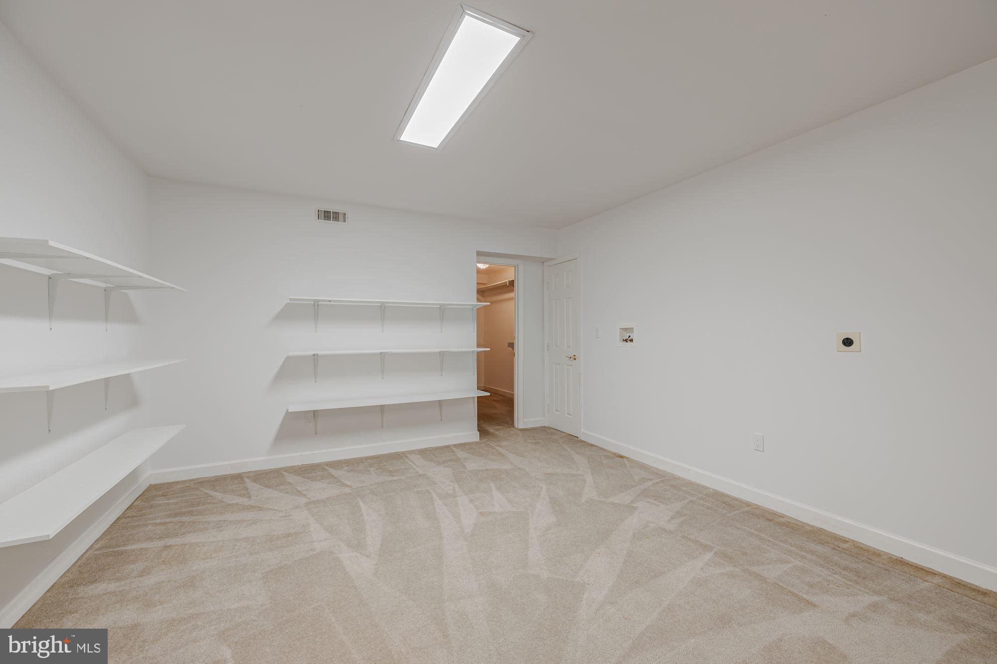 685 Potomac River Road McLean, VA 22102 - Photo 52 of 60 Finished Storage Room w/ Laundry Hookups