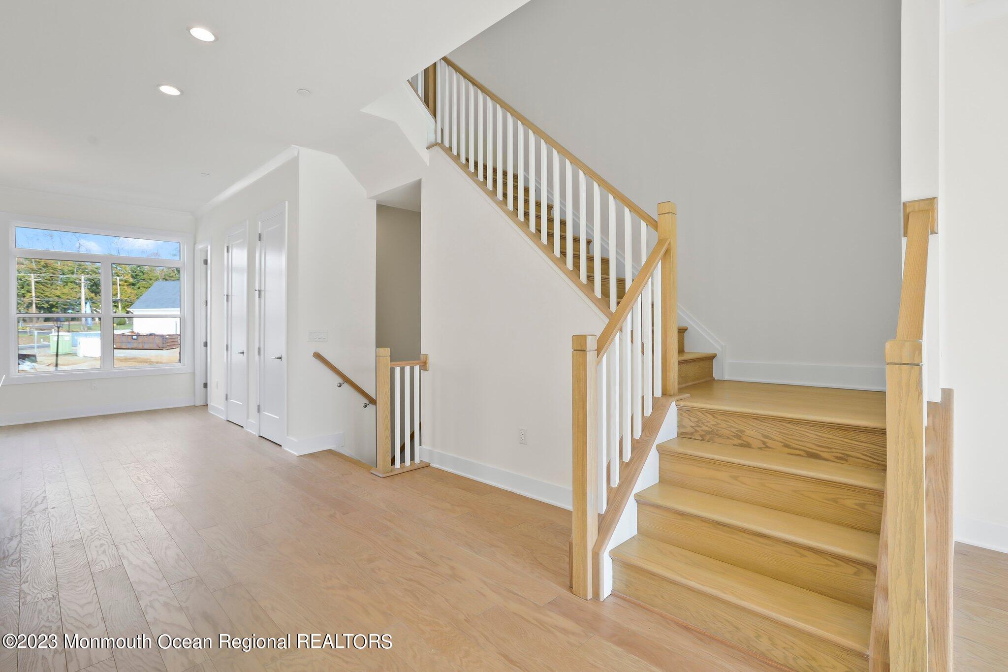 3 Valiant Court Middletown, NJ 07748 - Photo 17 of 42 a view of entryway with wooden floor and windows