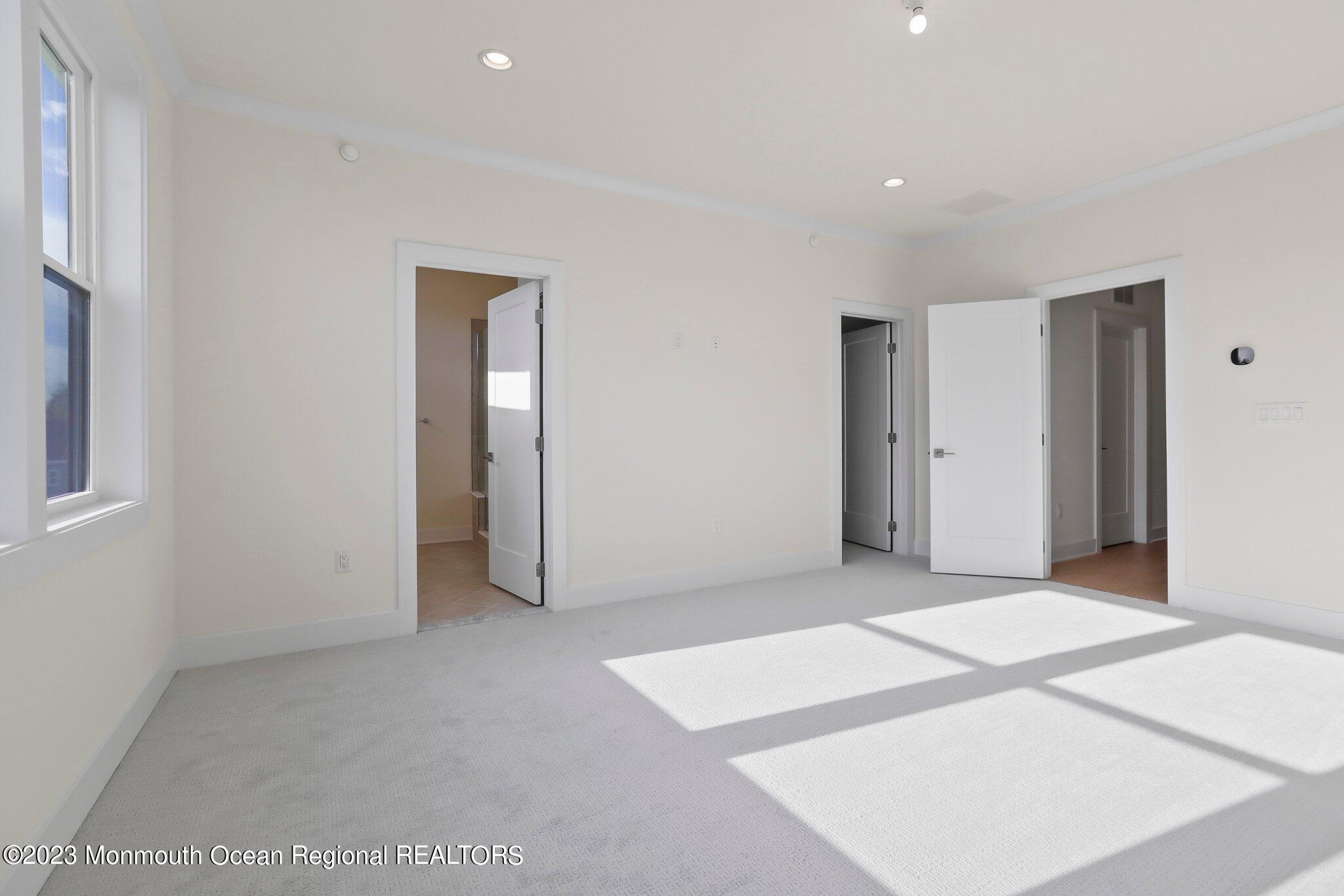 3 Valiant Court Middletown, NJ 07748 - Photo 20 of 42 a view of an empty room