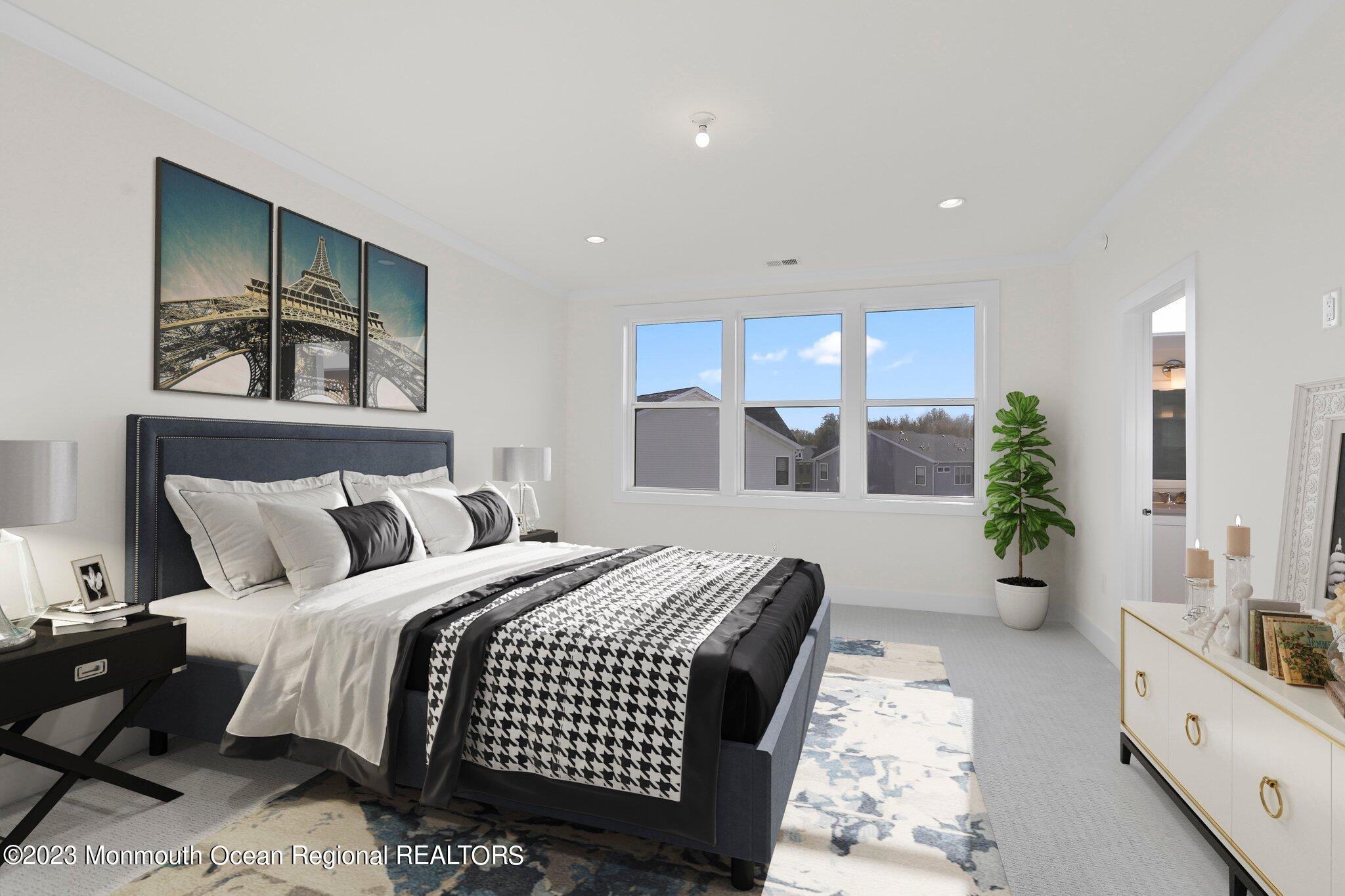 3 Valiant Court Middletown, NJ 07748 - Photo 21 of 42 a bedroom with a large bed and potted plant