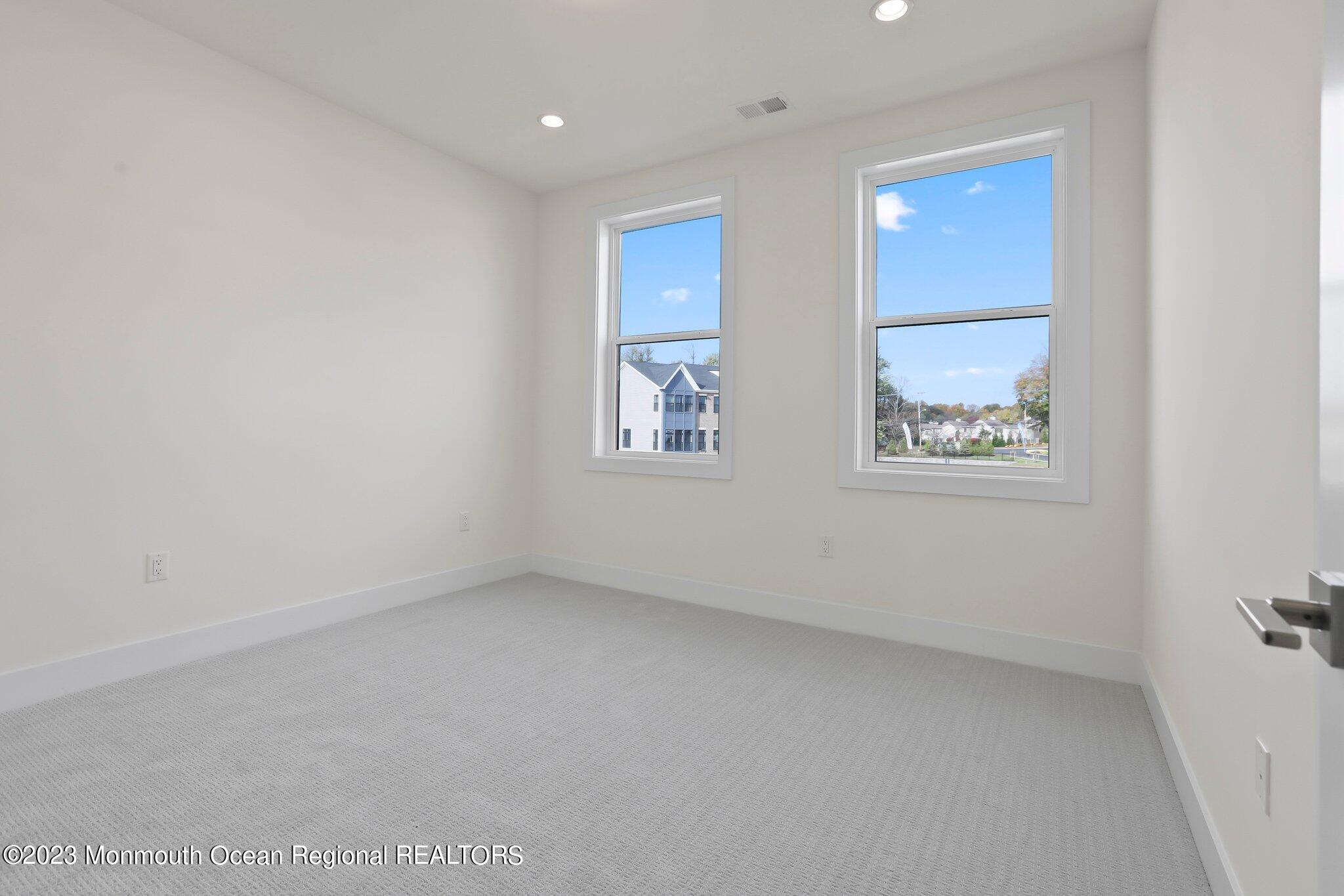 3 Valiant Court Middletown, NJ 07748 - Photo 27 of 42 an empty room with a window