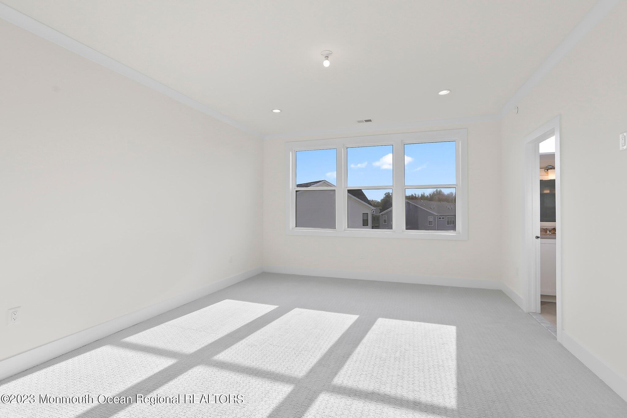 3 Valiant Court Middletown, NJ 07748 - Photo 29 of 42 a view of an empty room with window